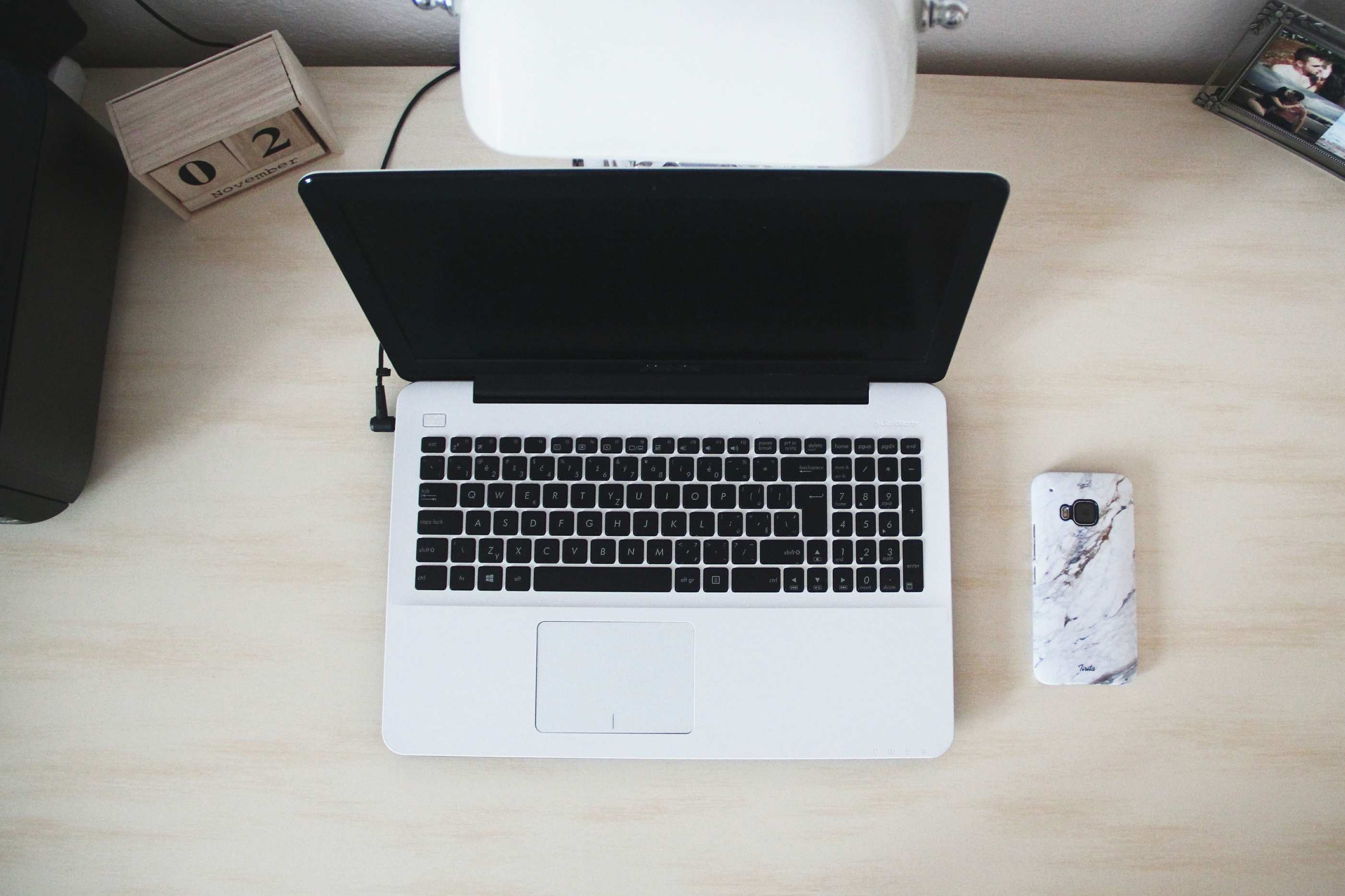 Developer workstation with monitors on a desk, minimalist workspace featuring a laptop